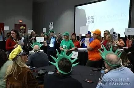 A group of people in a room

AI-generated content may be incorrect.